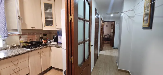 Práctico y cómodo piso en ciudad jardín — 12