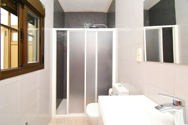 VIVIENDA DE PLANTA BAJA CON SOLARIUM Y COCHERA — 16