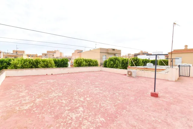 VIVIENDA DE PLANTA BAJA CON SOLARIUM Y COCHERA — 21