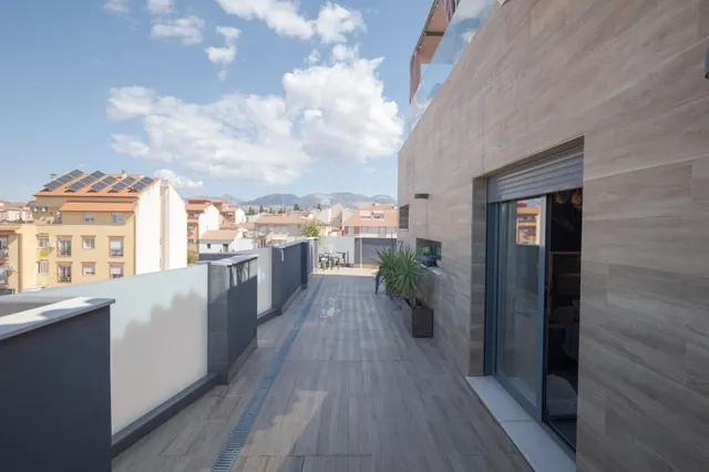 Ático dúplex con piscina en Maracena — 48