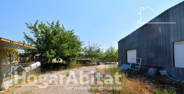 GRAN PARCELA CON VIVIENDA Y AMPLIA TERRAZA — 39