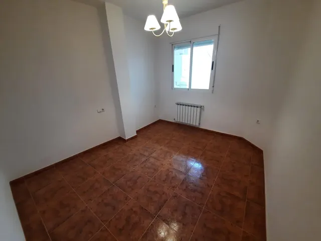 VIVIENDA EN PLANTA BAJA — 15