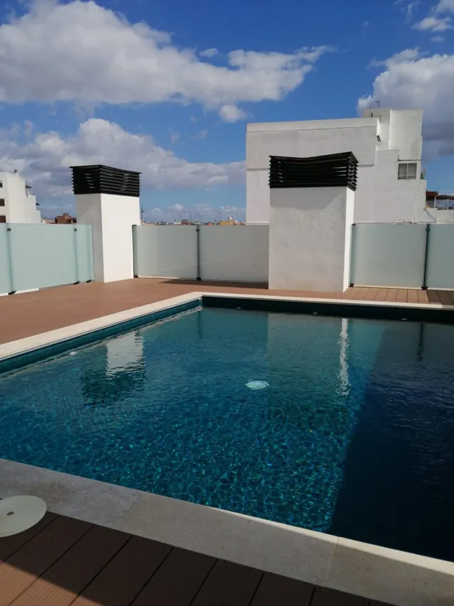 Piso a estrenar con terraza de 40 m2, parking y piscina en calle peatonal Nuredduna – Palma. — 7