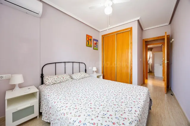 Bungalow de dos dormitorios y piscina comunitaria en Orihuela Costa — 5