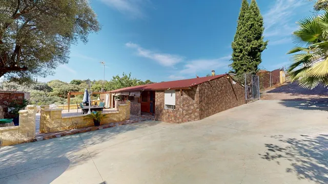 Parcela de más de 1.500 m2 con casa de madera y vistas despejadas en Cuevas Bajas, (Almodóvar del Río) — 11