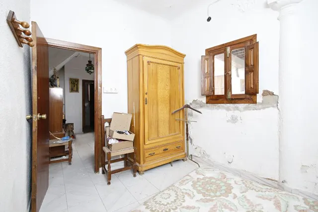 Calle Arriola junto San Juan de Dios — 19