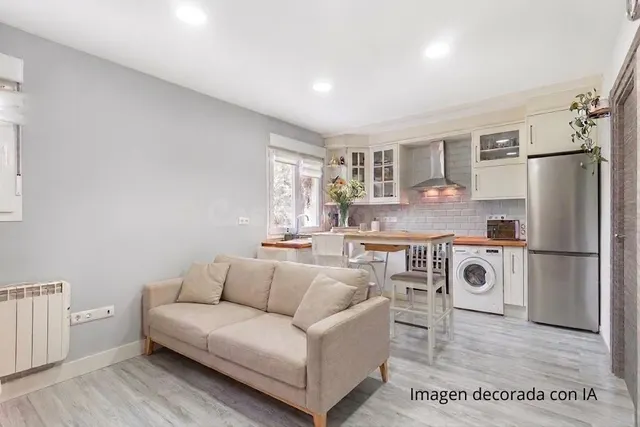 Piso reformado con parcela privada en Roces - foto 2