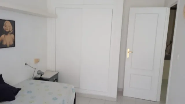 Apartamento de 1 dormitorio con vistas laterales al mar — 16
