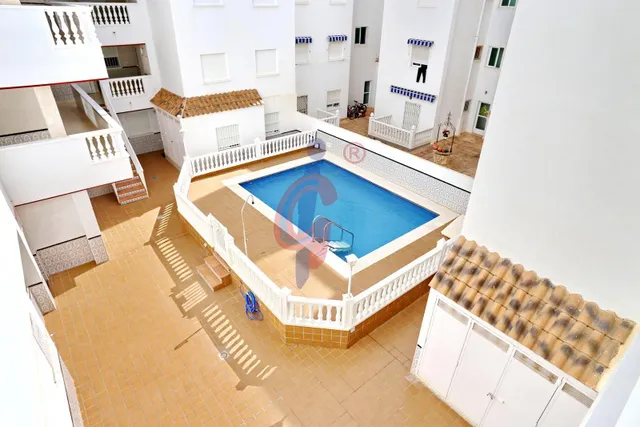 Piso impecable en Las Viñas con piscina comunitaria, terraza acristalada y muy cerca del mar — 28