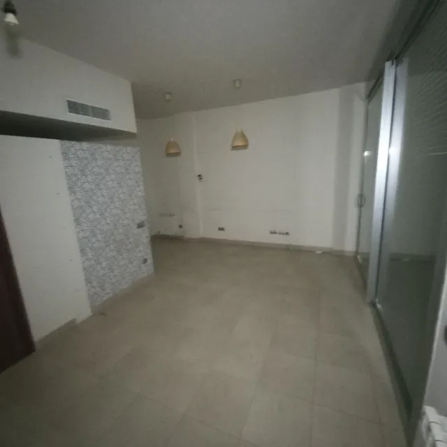 Planta baja con parking. — 12