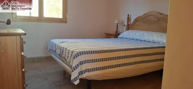 CASA DE DOS PLANTAS EN SELLA CON BUARDILLA — 7
