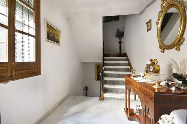 Calle Arriola junto San Juan de Dios — 48