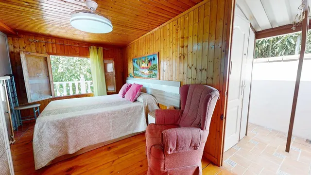Parcela de más de 1.500 m2 con casa de madera y vistas despejadas en Cuevas Bajas, (Almodóvar del Río) — 14