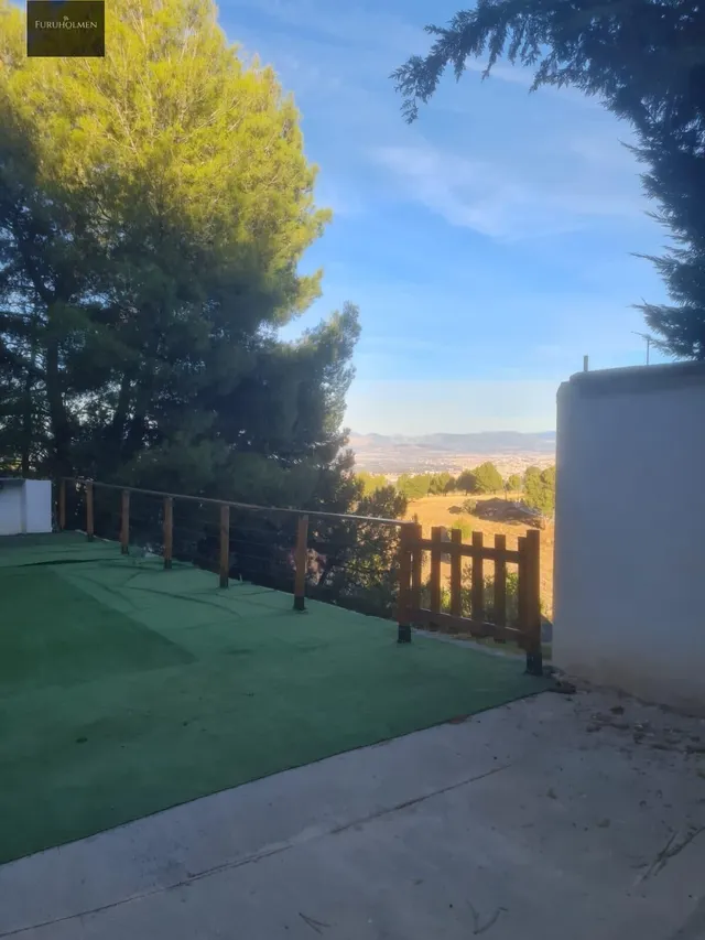 Parcela con una casita de madera en Cumbres Verdes. — 25