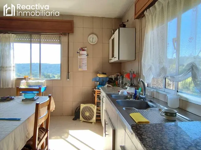 Casa de 3 habitaciones con finca. — 40