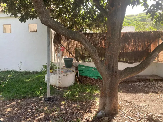 PARCELA CON TRES APARTAMENTOS — 28
