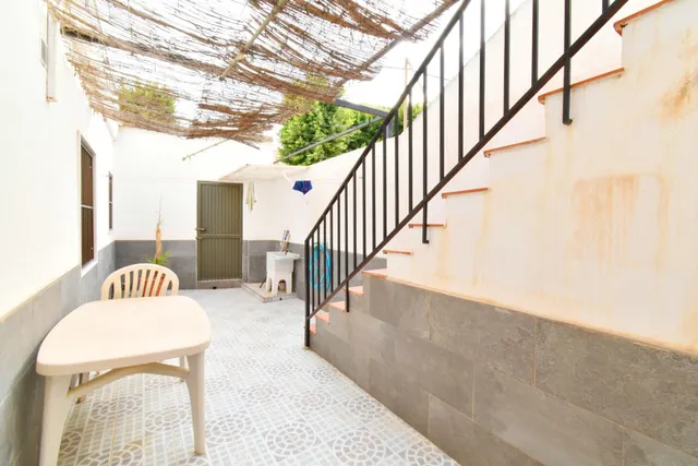 VIVIENDA DE PLANTA BAJA CON SOLARIUM Y COCHERA — 11