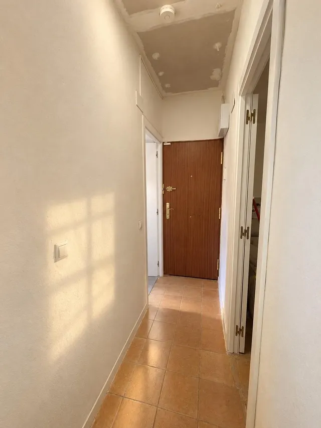 210.000 € | Luminoso piso SUR semirreformado en Casco Antiguo de Leganés (edificio de pocos apartamentos) — 11