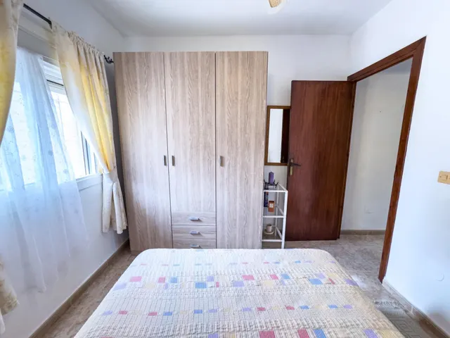 Encantador adosado de 2 plantas en Nueva Torrevieja — 2 dormitorios, 2 baños, gran patio y piscina comunitaria — 26