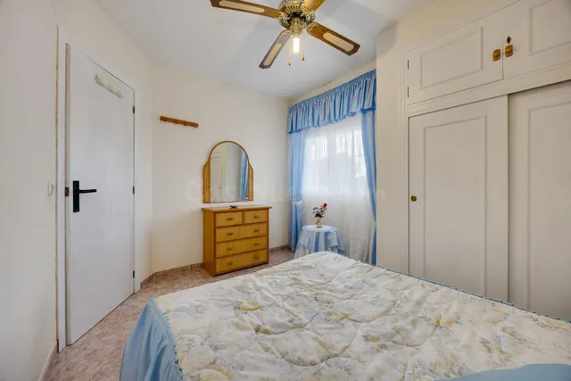 Bungalow planta alta de 3 dormitorios con piscina y plaza de garaje comunitaria. — 12