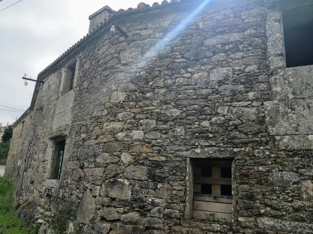 Conjunto de viviendas semirestauradas en Baio — 38