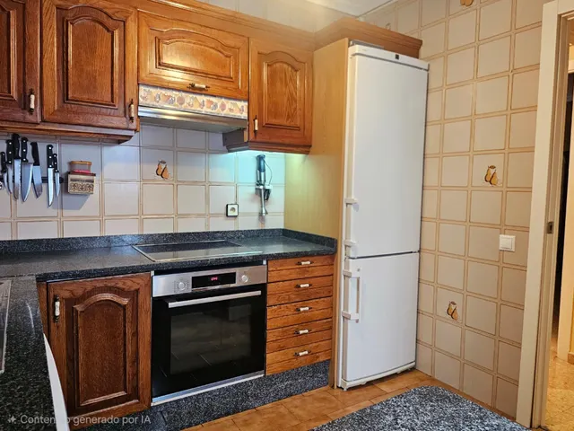 Piso de 4 dormitorios con plaza de garaje en San Basilio, con terraza de 20 m2 anexa al trastero en la cubierta. — 32
