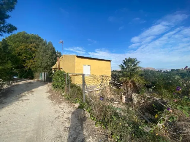 Terreno rústico 6.552m2 con una casa — 16