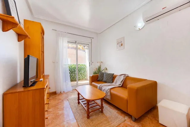 APARTAMENTO DE DOS DORMITORIOS CON VISTAS A LA LAGUNA ROSA Y CON PISCINA COMUNITARIA — 2