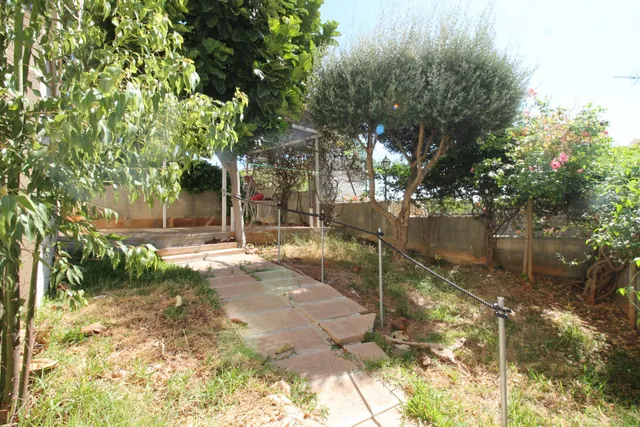 PLANTA BAJA CON JARDIN , GARAJES, TRASTERO Y PISICINA COMUNITARIA JUNTO A MARIVENT — 6