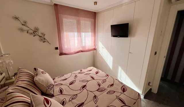 Espectacular piso reformado con diseño y calidad,  con vistas impresionantes al mar y Benidorm. — 23