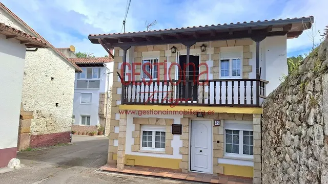 CASA COMPLETAMENTE REFORMADA EN ARENAS DE IGUÑA. — 32