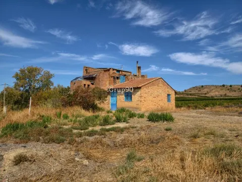 TERRENO DE 7.274 m2 CON CASA A REFORMAR, A 10 MINUTOS DE LLEIDA