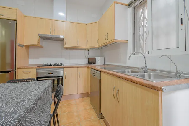BAJO CON DISTRIBUCIÓN DE VIVIENDA Y PATIO EN GRAU DE VALENCIA — 15