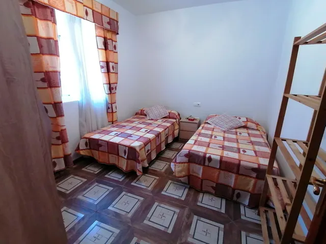 Casa en Alquiler con Patio y 3 Dormitorios — 14