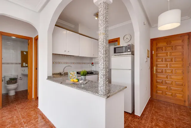 Apartamento de dos dormitorios en residencial con piscina comunitaria — 11