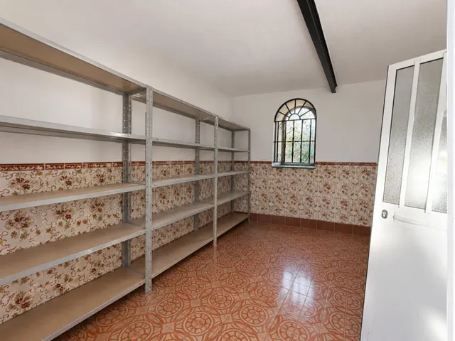 VIVIENDA CON PATIO, GARAJE Y COCINA EXTERIOR EN ZONA RESIDENCIAL — 21