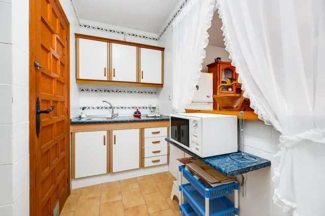 Bungalow de 3 dormitorios con piscina comunitaria en la playa de Los Locos — 14