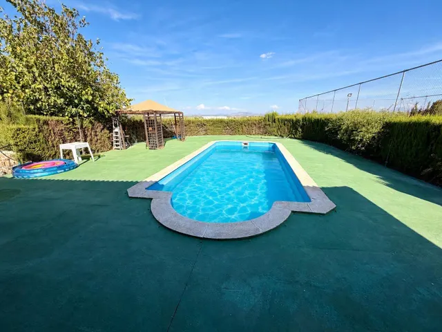 Finca en Mollina con casa, piscina, pista de tenis y 7.000 m2 de olivar. — 34