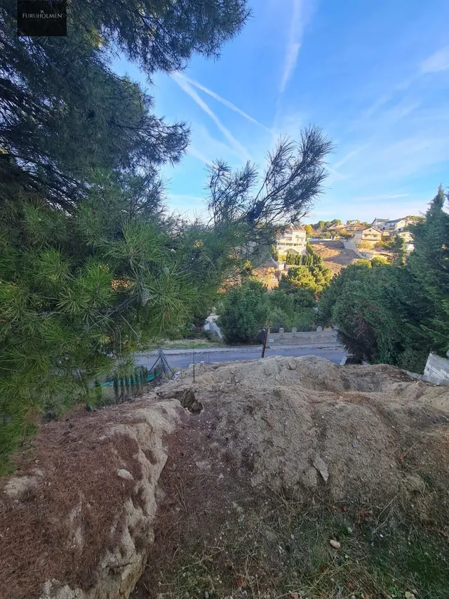 Parcela con una casita de madera en Cumbres Verdes. — 18