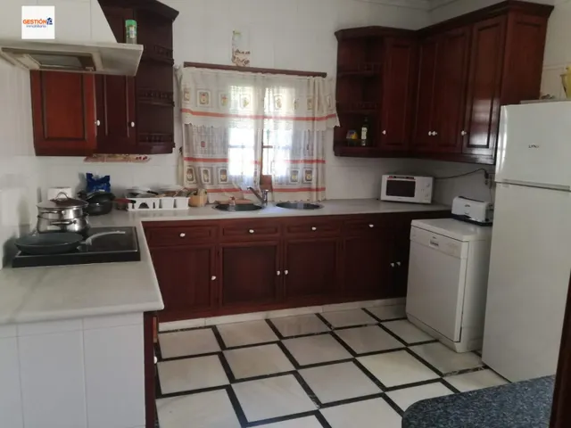 Casa independiente en parcela de 975 m2 con piscina — 18