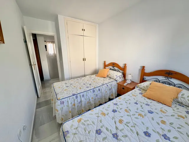 Casa adosada con dos patios privados y piscina comunitaria en Caleta de Vélez — 14