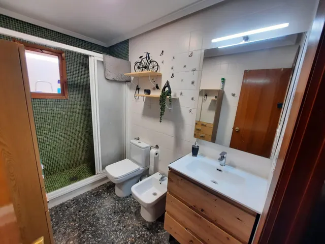 VIVIENDA CON GARAJE — 11
