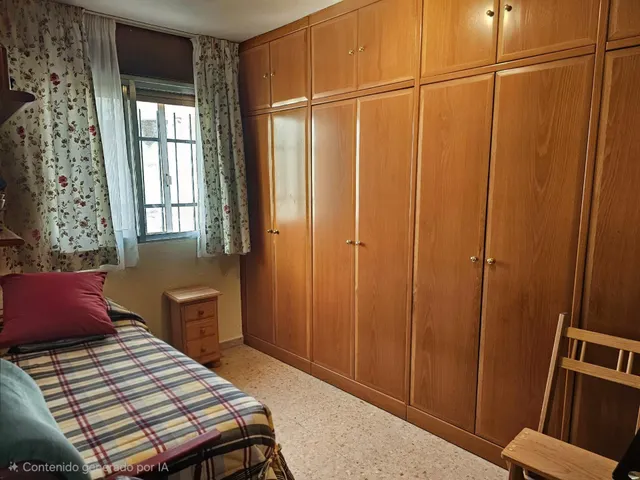Piso de 4 dormitorios con plaza de garaje en San Basilio, con terraza de 20 m2 anexa al trastero en la cubierta. — 35