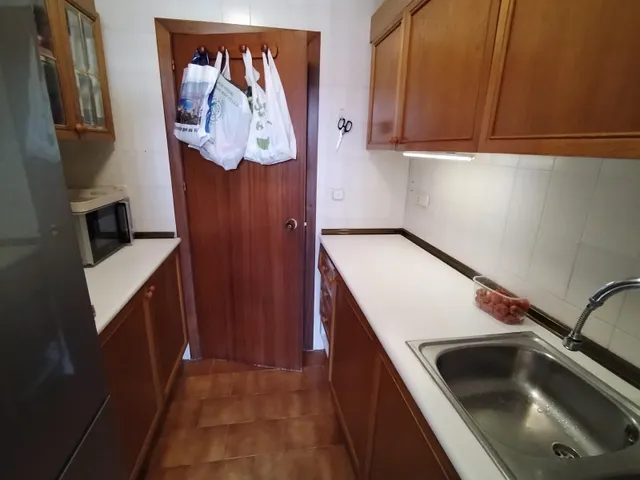Apartamento de esquina con 2 dormitorios y terraza acristlada en 1 Linea playa Levante. — 25