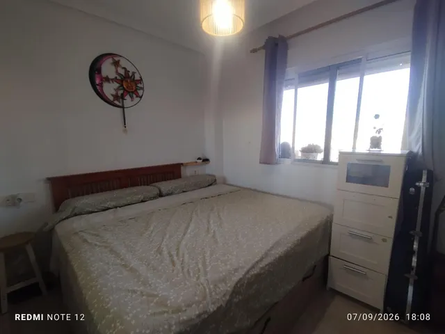 APARTAMENTO DE 1 DORMITORIO, CON PISCINA COMUNITARIA — 11