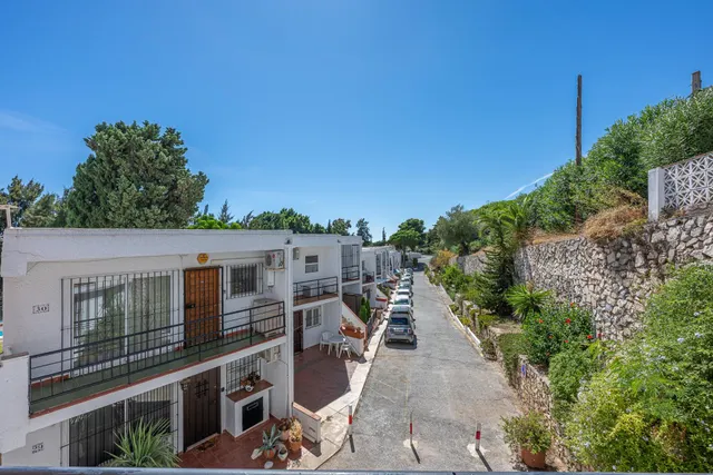 ¡Oportunidad en Doña Pilar! Piso de 2 dormitorios con piscina, jardines, parking y pista de tenis — 19