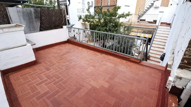 Casa amb pati i dues terrasses a 5 minuts del centre — 12