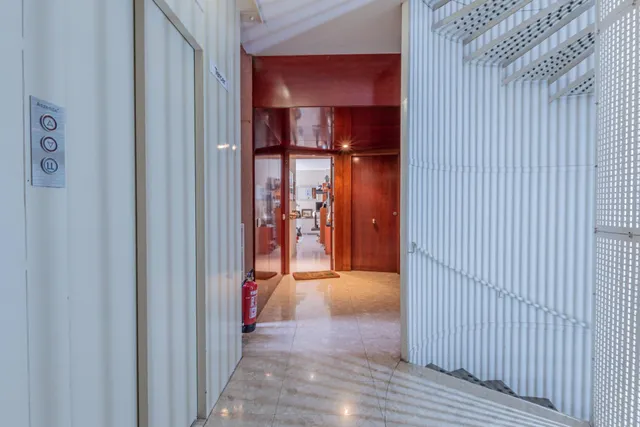 Acogedor piso de 2 dormitorios en el corazón de L'Eixample con posibilidad de alquiler de pk en la misma finca — 30