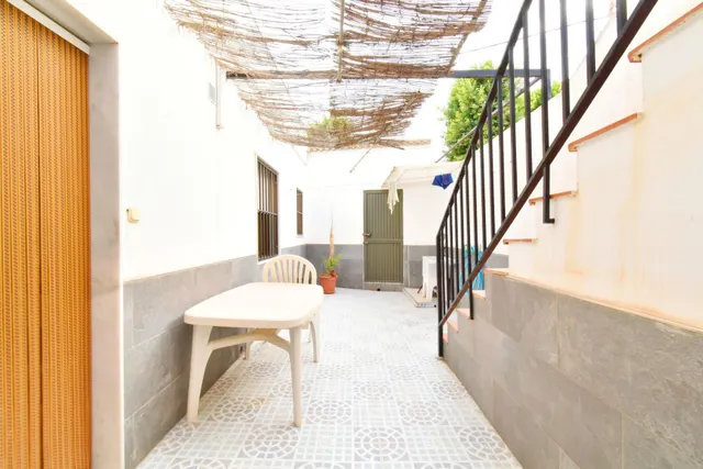 VIVIENDA DE PLANTA BAJA CON SOLARIUM Y COCHERA — 10
