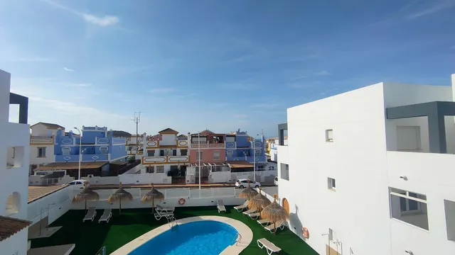 Apartamento de 1 dormitorio con terraza y piscina en Urbanización Milenio III en San Juan de los Terreros — 12